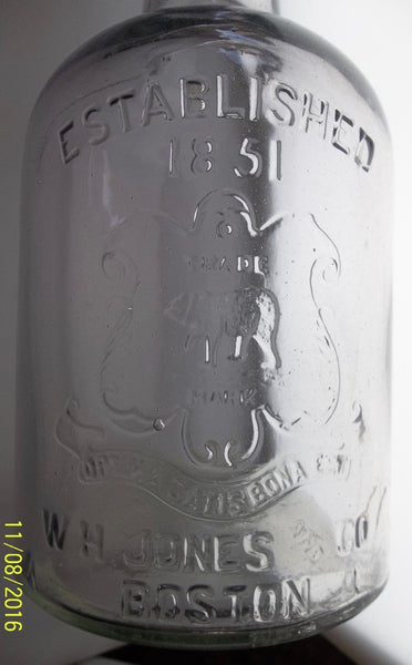 W.H. Jones & Co. Liquor Bottle