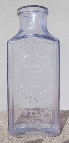 Purpled Geo. C. Frye Druggist Bottle from Portland, Maine