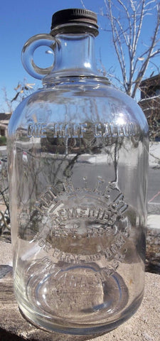 Geo.H.Lee Co. Remedies Glass Jug
