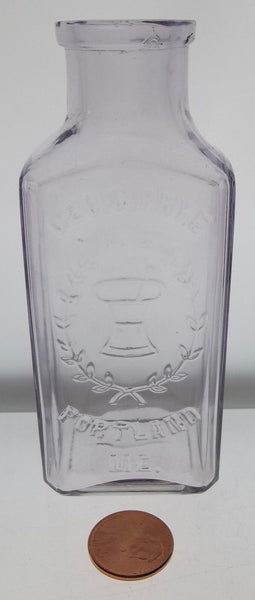 Purpled Geo. C. Frye Druggist Bottle from Portland, Maine