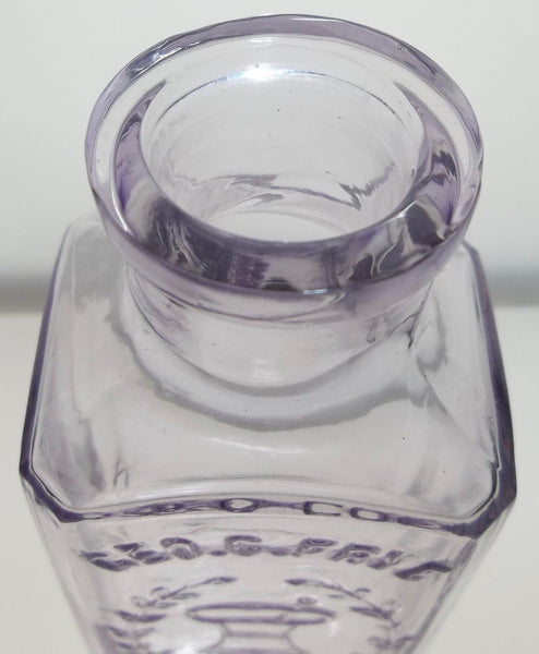 Purpled Geo. C. Frye Druggist Bottle from Portland, Maine